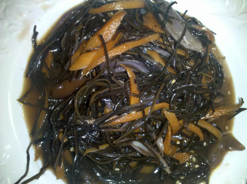 Sauteed Arame with Carrots and Red Onion with Sesame Seed Garnish